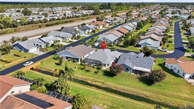 From the moment you step inside, cathedral ceilings fill the on Sabal Springs Golf and Racquet Club in Florida - for sale on GolfHomes.com, golf home, golf lot