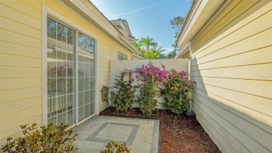 This MOVE-IN READY 2-bedroom, 2-bathroom villa with a den and on University Park Country Club in Florida - for sale on GolfHomes.com, golf home, golf lot