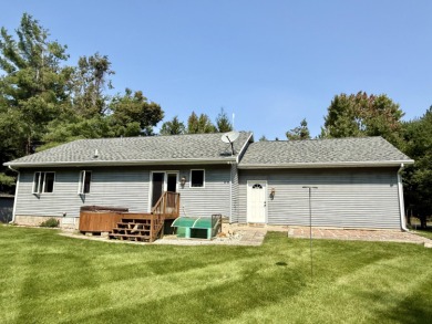 Lovely 4 bedroom 2 bath home built in 2000. Home features an on Michaywe Pines Course in Michigan - for sale on GolfHomes.com, golf home, golf lot