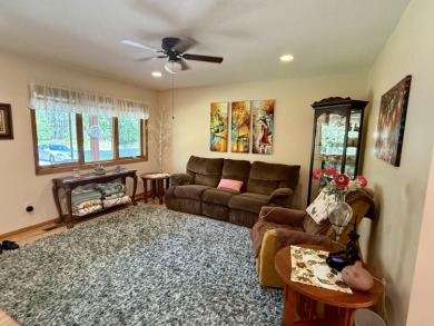 Lovely 4 bedroom 2 bath home built in 2000. Home features an on Michaywe Pines Course in Michigan - for sale on GolfHomes.com, golf home, golf lot