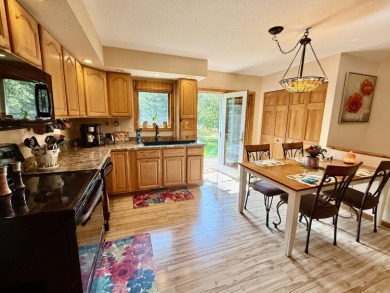 Lovely 4 bedroom 2 bath home built in 2000. Home features an on Michaywe Pines Course in Michigan - for sale on GolfHomes.com, golf home, golf lot