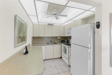 PRIME LOCATION IN CENTURY VILLAGE! THIS WELL SITUATED BUIDLING on Hillsboro Pines Golf in Florida - for sale on GolfHomes.com, golf home, golf lot