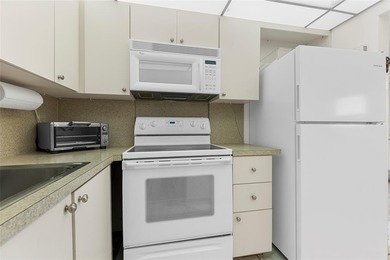 PRIME LOCATION IN CENTURY VILLAGE! THIS WELL SITUATED BUIDLING on Hillsboro Pines Golf in Florida - for sale on GolfHomes.com, golf home, golf lot