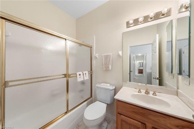 This four-bedroom, three-bathroom home is located within the on Fiddlesticks Country Club in Florida - for sale on GolfHomes.com, golf home, golf lot