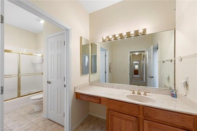 This four-bedroom, three-bathroom home is located within the on Fiddlesticks Country Club in Florida - for sale on GolfHomes.com, golf home, golf lot