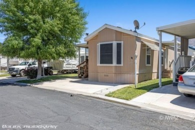 Located in the lovely 55 + Golf course community of Beaver Dam on Beaver Dam Resort in Arizona - for sale on GolfHomes.com, golf home, golf lot