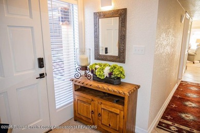 Beautifully upgraded & fully furnished, this 3-bedroom, 3-bath on Alto Lakes Golf and Country Club in New Mexico - for sale on GolfHomes.com, golf home, golf lot