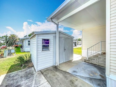 **For Sale: Charming Furnished Single Wide Home in a Vibrant 55+ on Lily Lake Golf and RV Resort in Florida - for sale on GolfHomes.com, golf home, golf lot