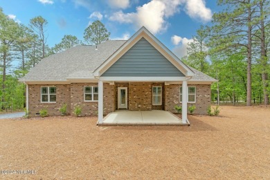 Beautiful new construction in desirable Seven Lakes West offers on Beacon Ridge Golf and Country Club in North Carolina - for sale on GolfHomes.com, golf home, golf lot