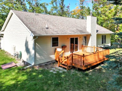 This low-maintenance 3-bedroom, 2-bath home features a bright on Michaywe Pines Course in Michigan - for sale on GolfHomes.com, golf home, golf lot