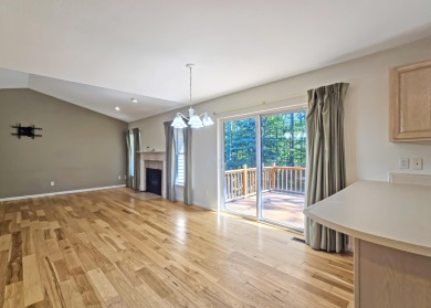 This low-maintenance 3-bedroom, 2-bath home features a bright on Michaywe Pines Course in Michigan - for sale on GolfHomes.com, golf home, golf lot