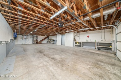 Brick Basement Ranch with two car garage on main level and on Lake Tansi Village Country Club in Tennessee - for sale on GolfHomes.com, golf home, golf lot