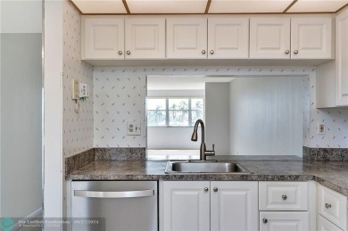 Bring your buyers to this very well maintained condo in Phase 4 on Sunrise Lakes Phase IV Golf Course in Florida - for sale on GolfHomes.com, golf home, golf lot