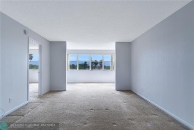 Bring your buyers to this very well maintained condo in Phase 4 on Sunrise Lakes Phase IV Golf Course in Florida - for sale on GolfHomes.com, golf home, golf lot