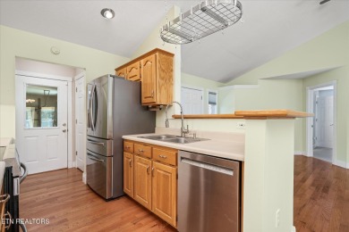 Brick Basement Ranch with two car garage on main level and on Lake Tansi Village Country Club in Tennessee - for sale on GolfHomes.com, golf home, golf lot