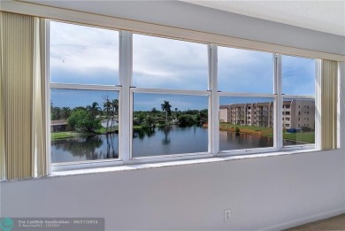 Bring your buyers to this very well maintained condo in Phase 4 on Sunrise Lakes Phase IV Golf Course in Florida - for sale on GolfHomes.com, golf home, golf lot