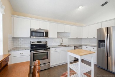 Located in the desirable Charter Club at Martin Downs, this on Monarch Country Club in Florida - for sale on GolfHomes.com, golf home, golf lot