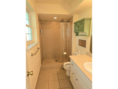 COME CHECK IT OUT! THIS CHARMING 3 BEDROOM 2 BATHROOM 2 CAR on Cedar Creek Country Club in Texas - for sale on GolfHomes.com, golf home, golf lot