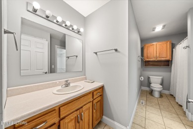 Brick Basement Ranch with two car garage on main level and on Lake Tansi Village Country Club in Tennessee - for sale on GolfHomes.com, golf home, golf lot