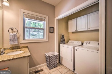 PRICE IMPROVEMENT - WATERFRONT RETREAT - PERFECT FOR THE KAYAK on The Highlands Course at Lake Arrowhead in Georgia - for sale on GolfHomes.com, golf home, golf lot