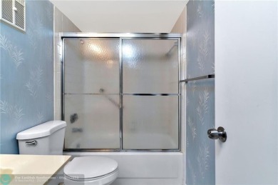 Bring your buyers to this very well maintained condo in Phase 4 on Sunrise Lakes Phase IV Golf Course in Florida - for sale on GolfHomes.com, golf home, golf lot
