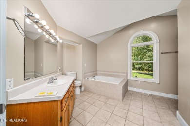 Brick Basement Ranch with two car garage on main level and on Lake Tansi Village Country Club in Tennessee - for sale on GolfHomes.com, golf home, golf lot