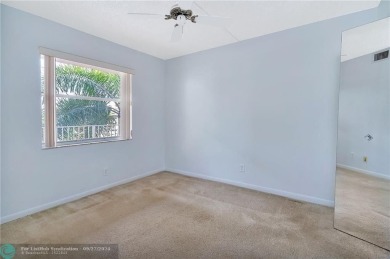 Bring your buyers to this very well maintained condo in Phase 4 on Sunrise Lakes Phase IV Golf Course in Florida - for sale on GolfHomes.com, golf home, golf lot