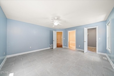 Brick Basement Ranch with two car garage on main level and on Lake Tansi Village Country Club in Tennessee - for sale on GolfHomes.com, golf home, golf lot
