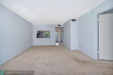 Bring your buyers to this very well maintained condo in Phase 4 on Sunrise Lakes Phase IV Golf Course in Florida - for sale on GolfHomes.com, golf home, golf lot