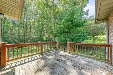 Brick Basement Ranch with two car garage on main level and on Lake Tansi Village Country Club in Tennessee - for sale on GolfHomes.com, golf home, golf lot
