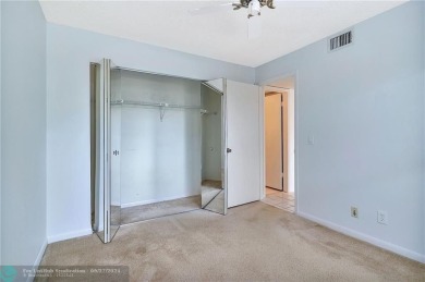 Bring your buyers to this very well maintained condo in Phase 4 on Sunrise Lakes Phase IV Golf Course in Florida - for sale on GolfHomes.com, golf home, golf lot