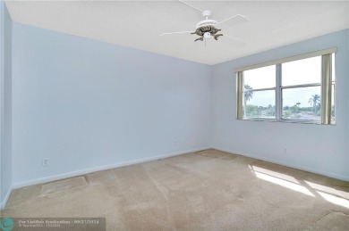 Bring your buyers to this very well maintained condo in Phase 4 on Sunrise Lakes Phase IV Golf Course in Florida - for sale on GolfHomes.com, golf home, golf lot