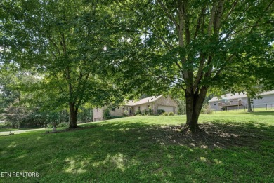 Brick Basement Ranch with two car garage on main level and on Lake Tansi Village Country Club in Tennessee - for sale on GolfHomes.com, golf home, golf lot