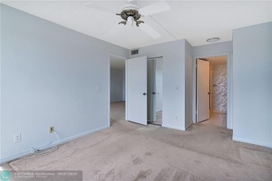 Bring your buyers to this very well maintained condo in Phase 4 on Sunrise Lakes Phase IV Golf Course in Florida - for sale on GolfHomes.com, golf home, golf lot
