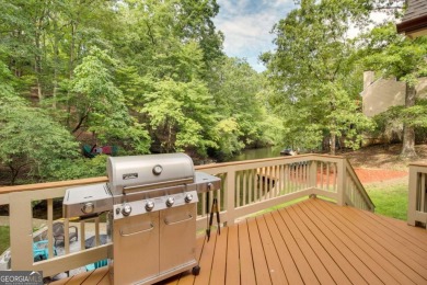 PRICE IMPROVEMENT - WATERFRONT RETREAT - PERFECT FOR THE KAYAK on The Highlands Course at Lake Arrowhead in Georgia - for sale on GolfHomes.com, golf home, golf lot