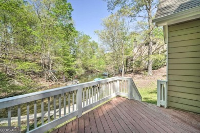 PRICE IMPROVEMENT - WATERFRONT RETREAT - PERFECT FOR THE KAYAK on The Highlands Course at Lake Arrowhead in Georgia - for sale on GolfHomes.com, golf home, golf lot