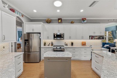 Welcome to 5353 Hogan Ln in Winter Haven, FL -- a beautifully on Lake Ashton Golf Club in Florida - for sale on GolfHomes.com, golf home, golf lot