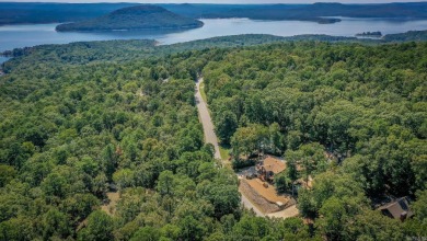 Tucked into a serene, park-like setting, this beautifully on  in Arkansas - for sale on GolfHomes.com, golf home, golf lot