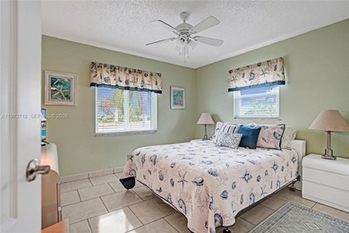 Step into comfort and convenience with this charming and on Leisureville Community Golf Course in Florida - for sale on GolfHomes.com, golf home, golf lot