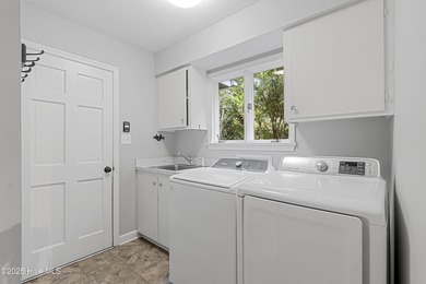 Golf Front Home in the Heart of Whispering Pines. Overlooking on Whispering Pines Golf Course in North Carolina - for sale on GolfHomes.com, golf home, golf lot