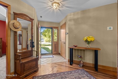 Unique architecture highlights this irresistible one-level home on Brandywine Bay Golf Club in North Carolina - for sale on GolfHomes.com, golf home, golf lot