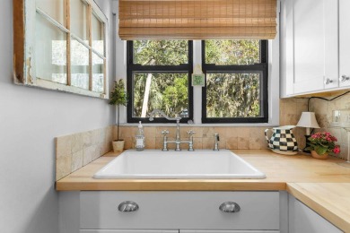 Nestled beneath the island's moss-draped live oaks and palms on The Seabrook Island Club in South Carolina - for sale on GolfHomes.com, golf home, golf lot