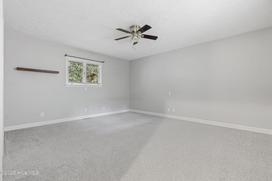 Golf Front Home in the Heart of Whispering Pines. Overlooking on Whispering Pines Golf Course in North Carolina - for sale on GolfHomes.com, golf home, golf lot