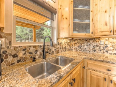 Located just off Hole #4 at the Angel Fire Resort Golf Course, 4 on Angel Fire Resort Country Club in New Mexico - for sale on GolfHomes.com, golf home, golf lot