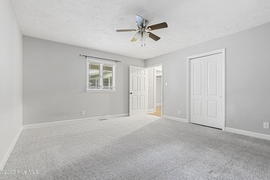 Golf Front Home in the Heart of Whispering Pines. Overlooking on Whispering Pines Golf Course in North Carolina - for sale on GolfHomes.com, golf home, golf lot