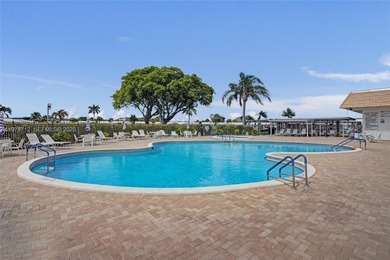 Step into comfort and convenience with this charming and on Leisureville Community Golf Course in Florida - for sale on GolfHomes.com, golf home, golf lot