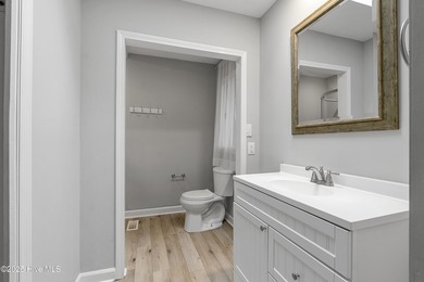 Golf Front Home in the Heart of Whispering Pines. Overlooking on Whispering Pines Golf Course in North Carolina - for sale on GolfHomes.com, golf home, golf lot