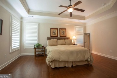 Discover easy living in this beautifully designed four bedroom on Lanier Island Legacy Golf Couorse in Georgia - for sale on GolfHomes.com, golf home, golf lot