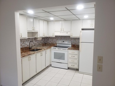 1st Floor Move in Ready Condo with Glass Enclosed Florida Room on Kings Point Golf -Flanders Way in Florida - for sale on GolfHomes.com, golf home, golf lot