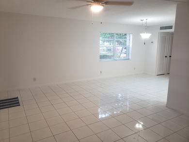1st Floor Move in Ready Condo with Glass Enclosed Florida Room on Kings Point Golf -Flanders Way in Florida - for sale on GolfHomes.com, golf home, golf lot